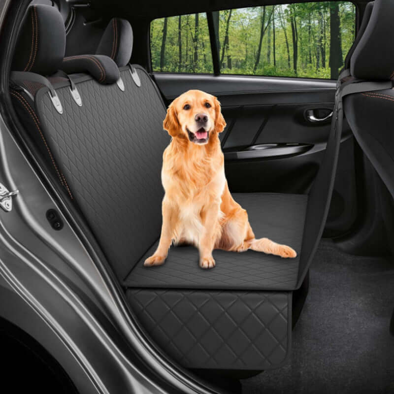 Happy dog relaxing on Bark Bliss car seat cover with mesh window, enjoying a safe and clean ride in the back seat.