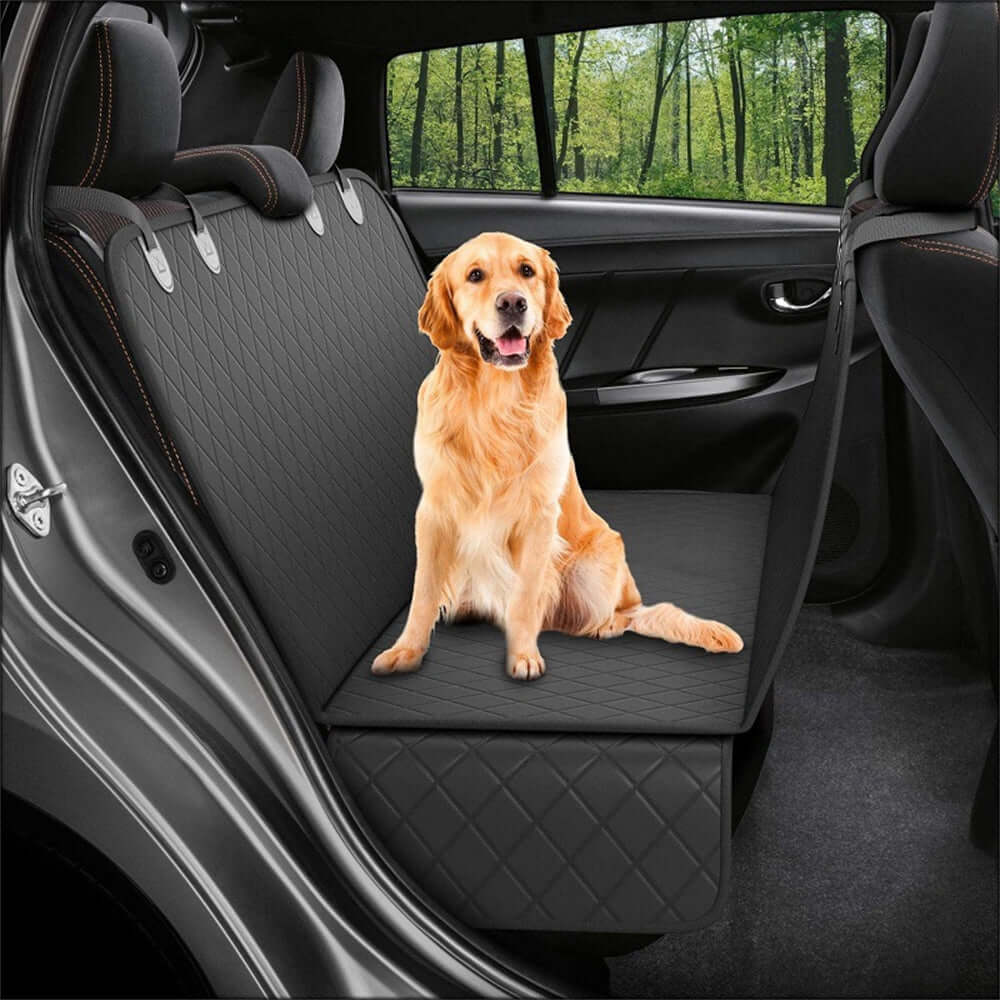 Happy dog relaxing on Bark Bliss car seat cover with mesh window, enjoying a safe and clean ride in the back seat.