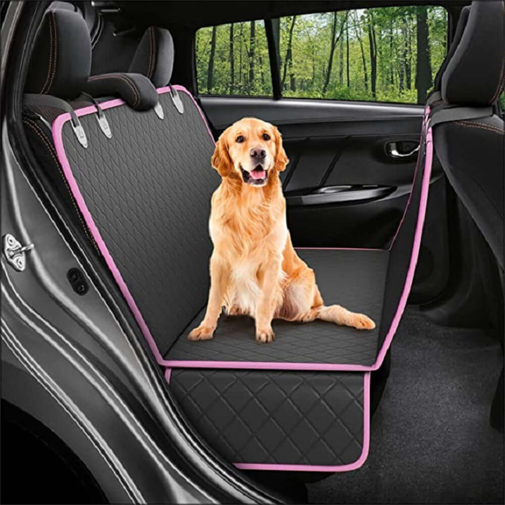 Happy dog relaxing on Bark Bliss car seat cover with mesh window, enjoying a safe and clean ride in the back seat.