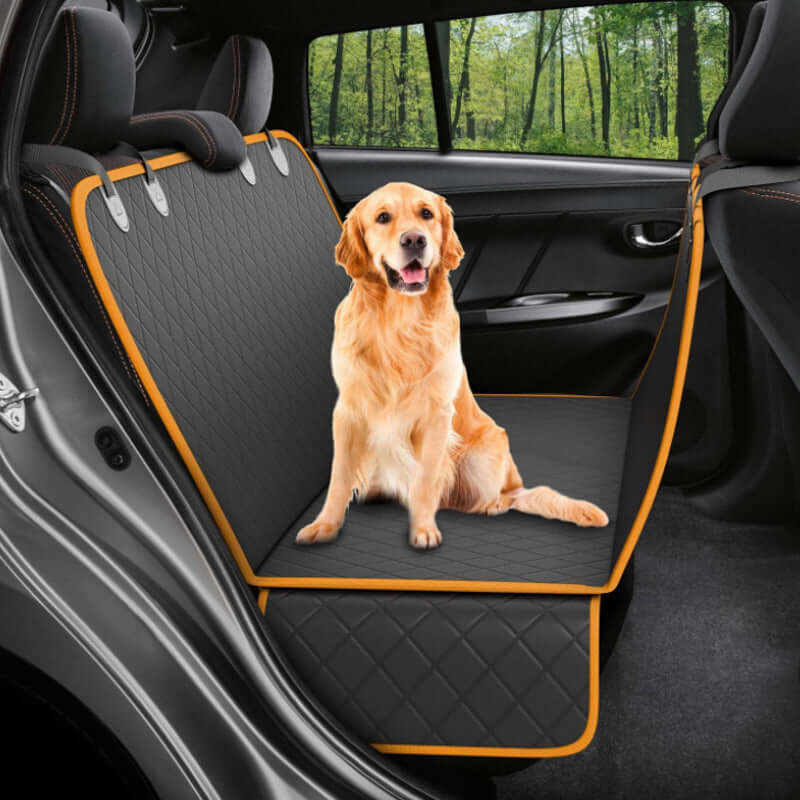 Happy dog relaxing on Bark Bliss car seat cover with mesh window, enjoying a safe and clean ride in the back seat.