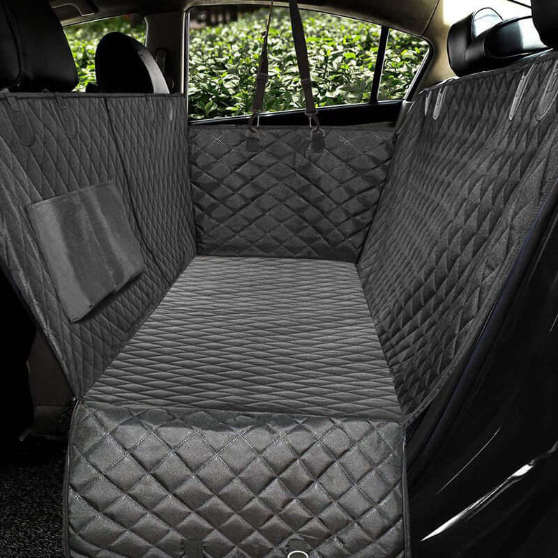 Bark Bliss Dog Car Seat Cover with Mesh Window – hammock-style rear seat protector installed in car for pet travel comfort.